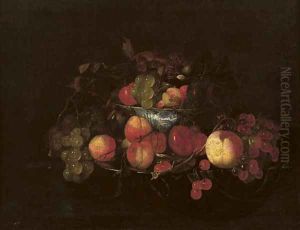 A silver plate with peaches and cherries