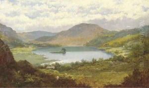 Sheep grazing in a mountainous lake landscape