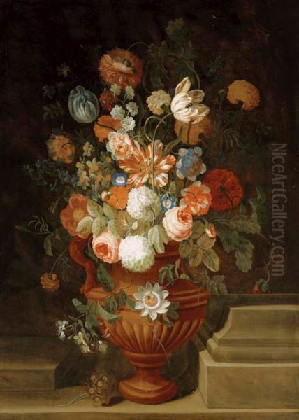 Flowers in a terracotta vase on a stone ledge - view 1