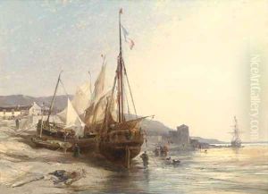 Fishing boats on the beach at low tide