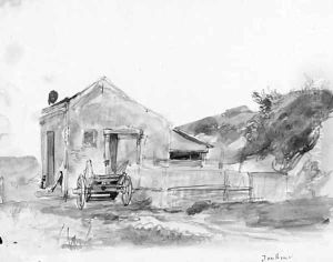A farm building with a wagon A farm building with a wagon