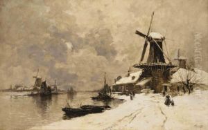 Windmills Along A Canal In Winter