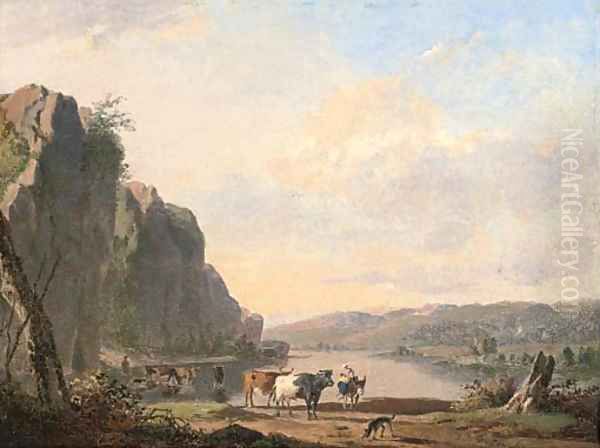 A mountainous landscape with cattle watering by a river - view 1