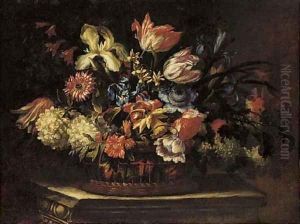 Tulips, irises, daffodils, poppies and other flowers in a basket on a plinth by Cornelis Kick