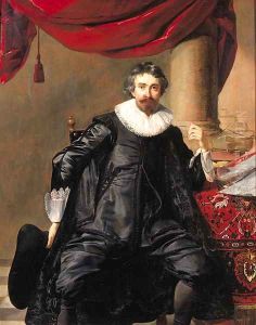 Portrait of a gentleman, in his forties, seated small full length by a table before a draped column