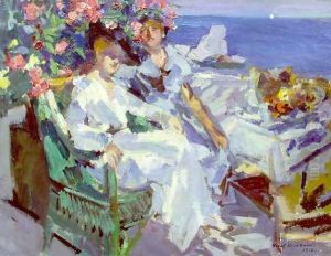 On a terrace by Konstantin Alexeievitch Korovin