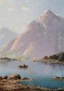 Rowing On A Lake With Mountains Beyond