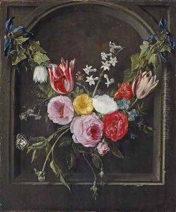 A swag of flowers hanging in a niche