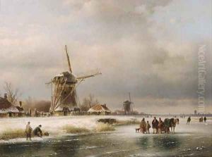 Figures on a frozen waterway with windmills on the river bank