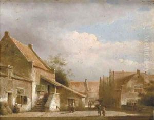 Figures in a Dutch village street by Kasparus Karsen