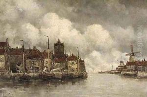 Moored vessels along a quay in a Dutch town