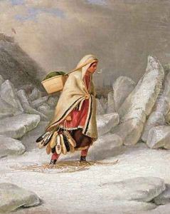 An Indian Woman Wearing Snowshoes