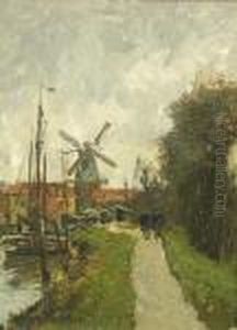 A Path By A Canal With A Windmill In The Distance A Path By A Canal With A Windmill In The Distance