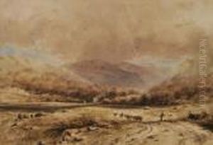 A Mountainous Landscape With A Herd Of Cattle In The
Foreground
