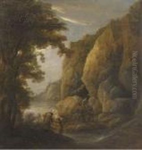 A Mountain Gorge With Travellers On A Path
