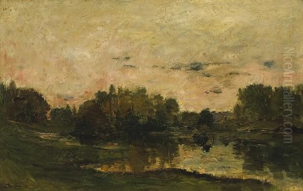 An Extensive Landscape At Sunset With A Lake In The Foreground - view 1