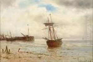 Beached Fishing Boat At The Entrance To A Harbour
