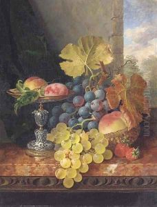 Still life with plums in a silver tazza, a peach, black and white grapes in a basket, and strawberries on a marble ledge by Edward Ladell