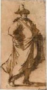 A Standing Man Wearing A Hat And Long Coat