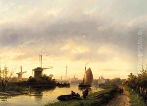 A river landscape at dusk, with Haarlem in the distance