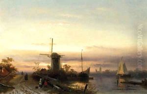 A river landscape with figures on a path at dusk, a town beyond