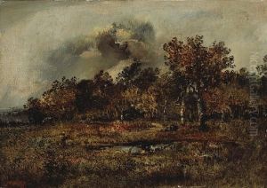 A Wooded Landscape With A Figure by Narcisse-Virgile D Az De La Pena