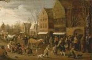 A Town View With Figures Gathered In The Street