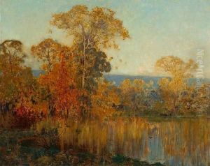 An Autumnal Woodland Scene With A Pond by Sir Alfred East