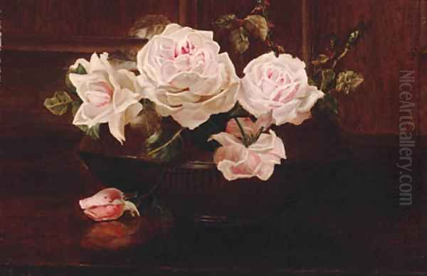 Roses in a bowl on a table - view 1