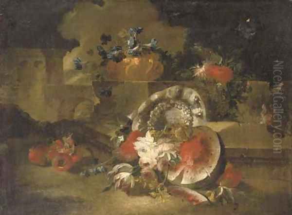 A sliced watermelon, pomegranates, roses, tulips and other flowers near a stone wall in a landscape - view 1