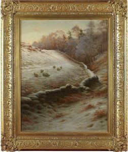Sheep Grazing In A Snow Covered Landscape