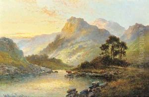 Cattle watering at dusk in a highland landscape