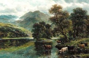 Highland cattle watering in a mountainous landscape