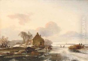 Skaters by a cottage in a Dutch winter landscape