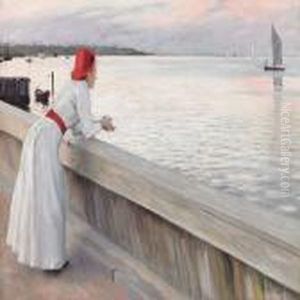 A Young Woman Watchingthe Sea In The Evening Sun