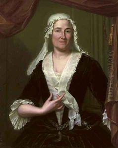 Portrait of a lady, half-length, in a dark green velvet dress and white chemise, wearing a white headdress
