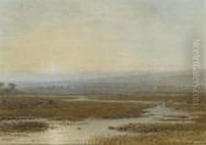 Cattle Grazing On The Banks Of A Meandering River At Sunset
