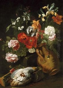 Roses, Iris, Poppies, Lilies And
 Other Flowers In A Tipped Earthenware Vase With A Partridge And 
Hourglass, On A Bank