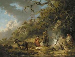 Gypsies around a camp fire in a woodland clearing by George Morland