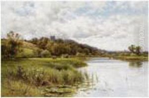 Cattle Grazing In A River Landscape With A Church Beyond