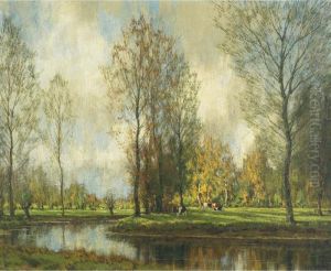 Cows Grazing By A Pond