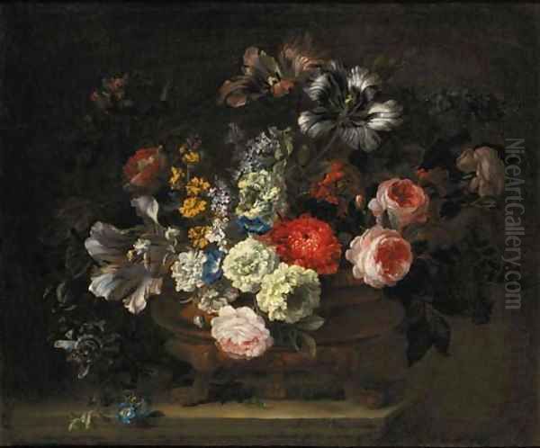 Roses, tulips, lilies, chrysanthemums, lilac, gentians and yellow sage in an urn on a marble ledge - view 1