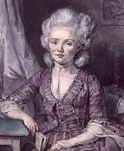 A young lady seated by a table with a book - view 1