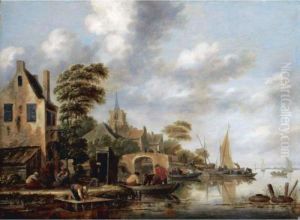 A Riverside Village With Figures Unloading Sailing Boats In The Background