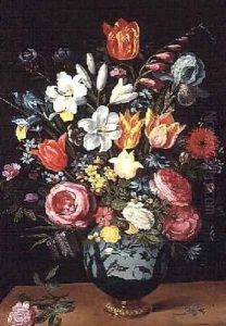 A Still Life of Flowers in a Porcelain Vase Resting on a Ledge by Phillipe de Marlier