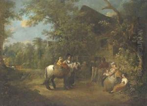 Figures by a cottage in a wooded landscape