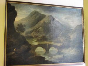 Figures By A Stone Bridge In An Extensive Mountain And River Landscape, Oil On Canvas by Julius Caesar Ibbetson