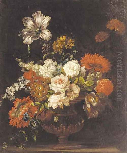 Roses, tulips, carnations, blue bells, morning glory and other flowers in an urn on a ledge - view 1