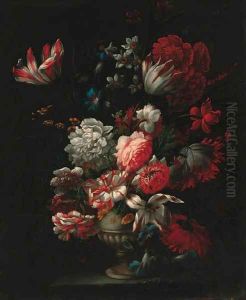 Carnations, tulips, narcisi, morning glory and other flowers in a vase on a ledge