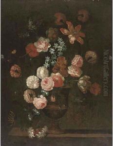 Roses, a parrot tulip, morning glory and other flowers in an urn on a ledge